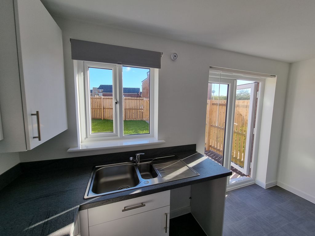 Property photo 3 of 13 Kitchen
