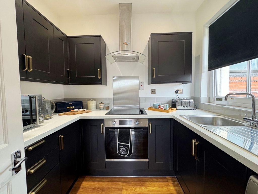 Property photo 2 of 12 Kitchen