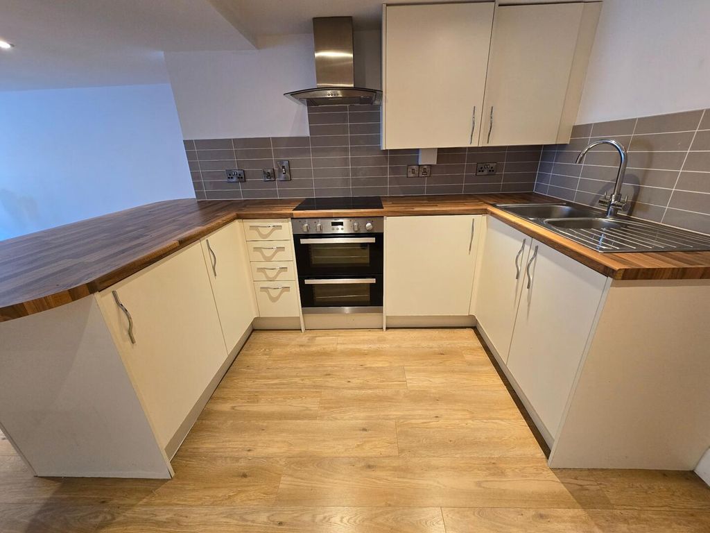 Property photo 1 of 3 Kitchen