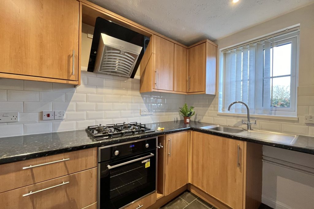 Property photo 2 of 8 Kitchen