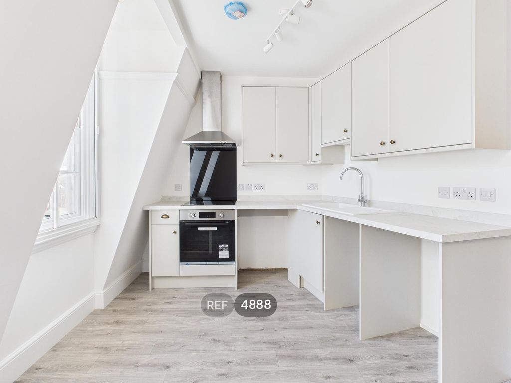 Property photo 1 of 8 Kitchen/Living Area