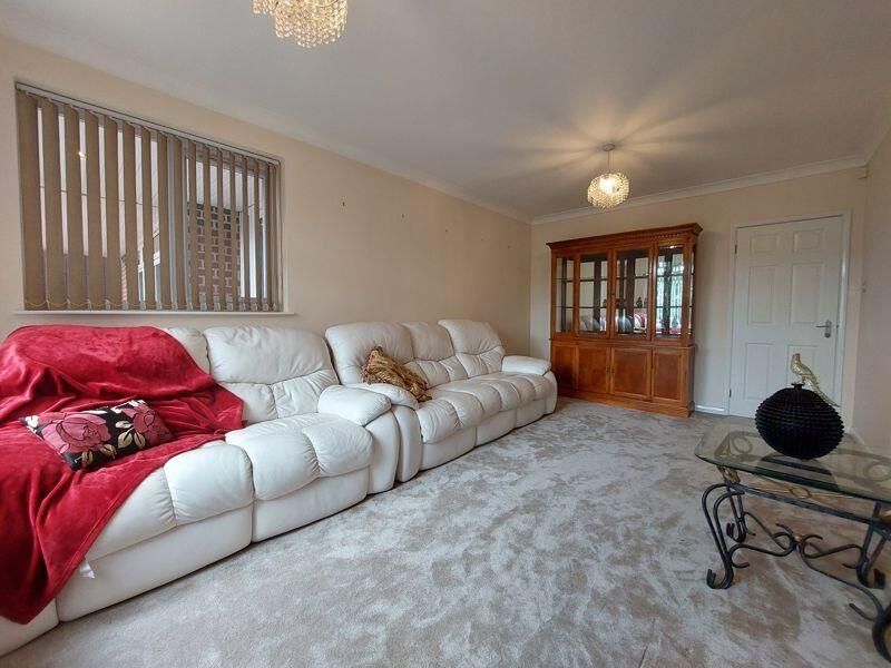 Property photo 1 of 11 A Spacious And Well-Maintained Living Room Featuri...