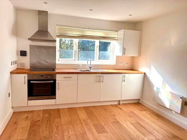 Property photo 2 of 8 Kitchen Area