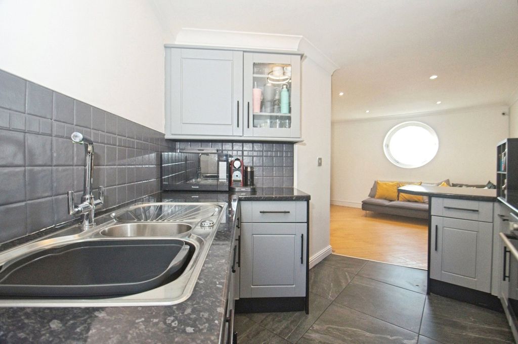 Property photo 2 of 17 Kitchen Area