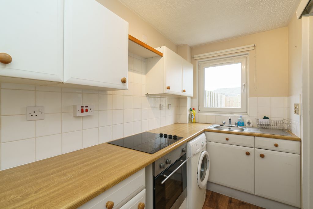 Property photo 3 of 13 4. Kitchen
