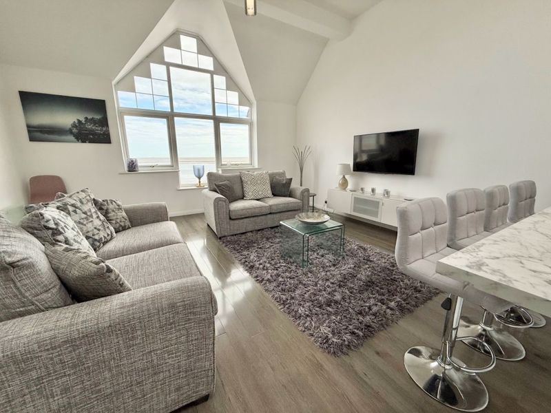 Property photo 1 of 10 Living Area