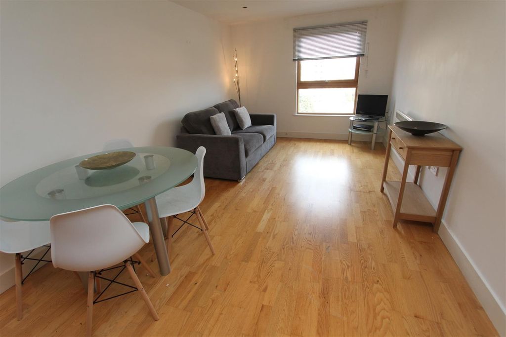 Property photo 1 of 10 Bright Living Area With Stylish Wood Flooring...