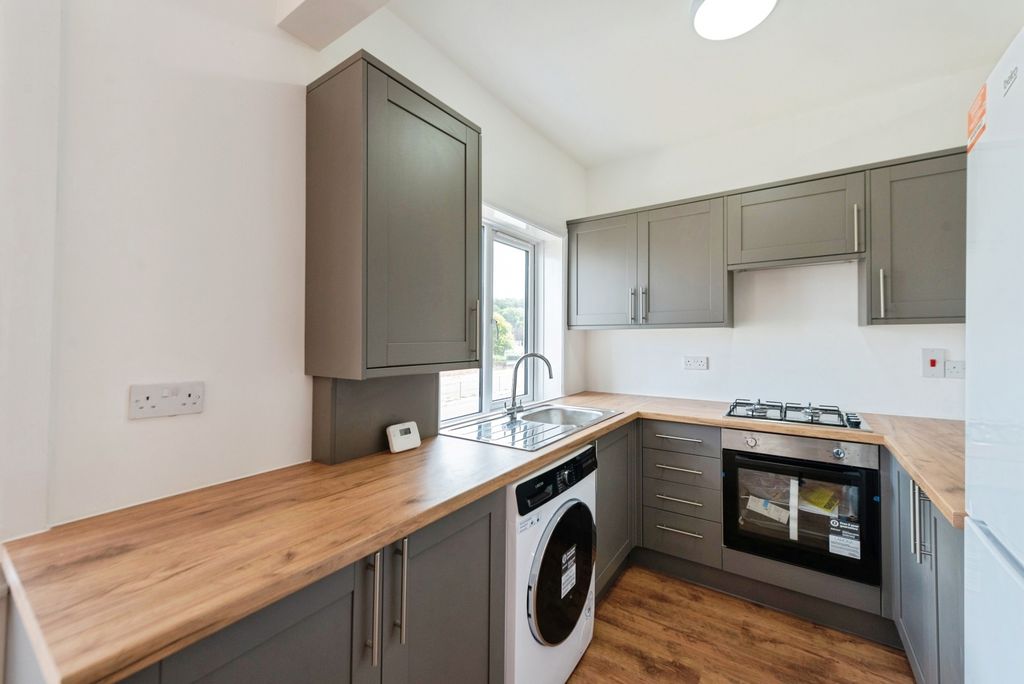 Property photo 2 of 12 Kitchen