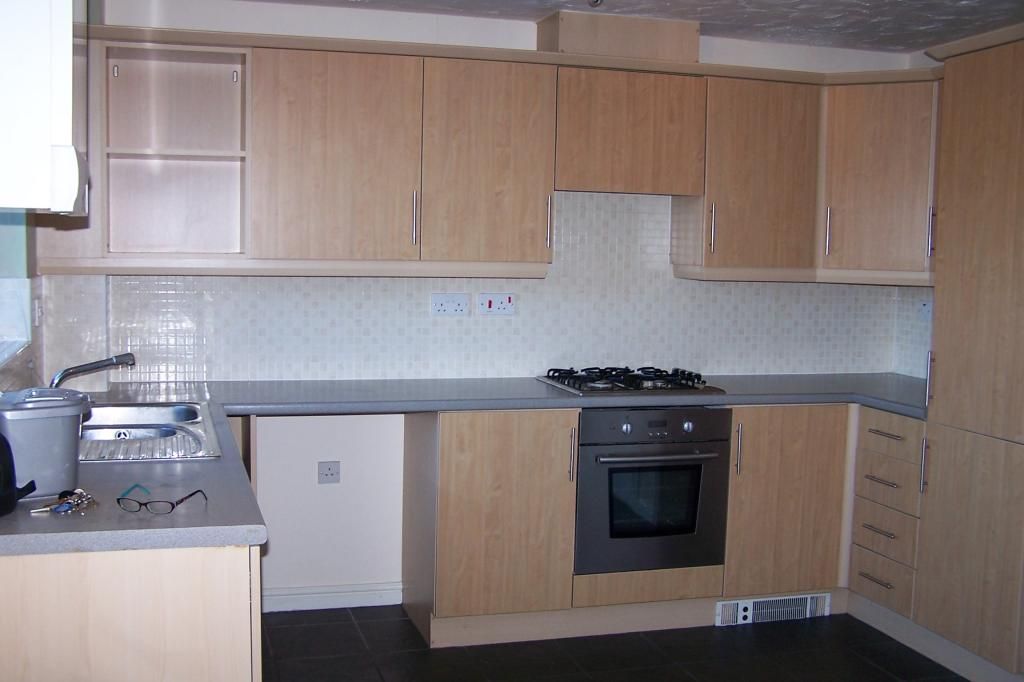 Property photo 3 of 7 Kitchen