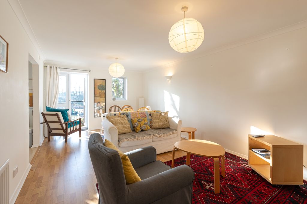 Property photo 1 of 10 Living Area