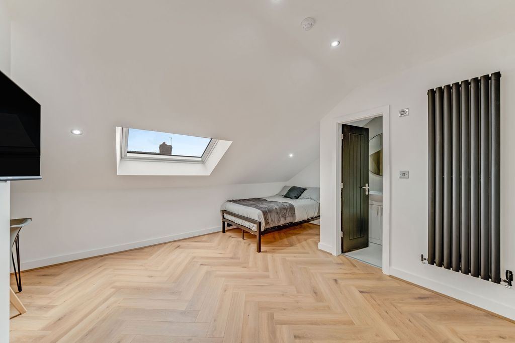 Property photo 2 of 3 Bright And Spacious Master Bedroom With A Skylight...