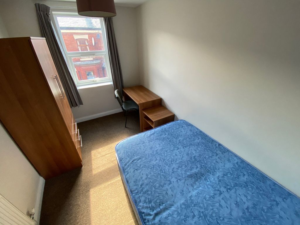 Property photo 3 of 9 A Cozy Double Bedroom Featuring A Comfortable Bed,...
