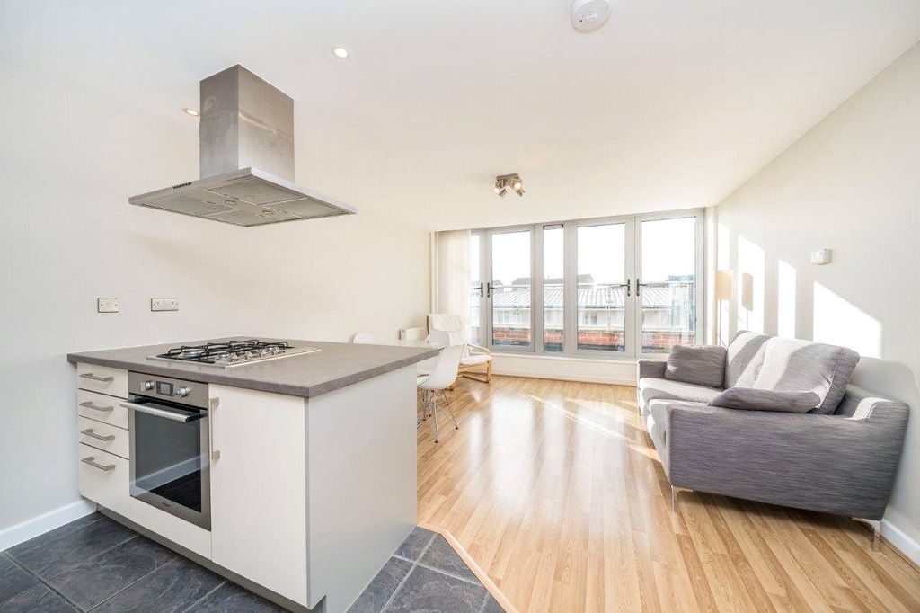 Property photo 1 of 7 Kitchen/Living Area