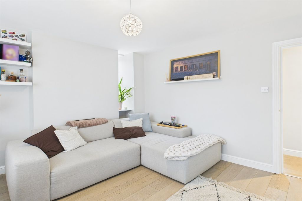 Property photo 3 of 13 Living Area