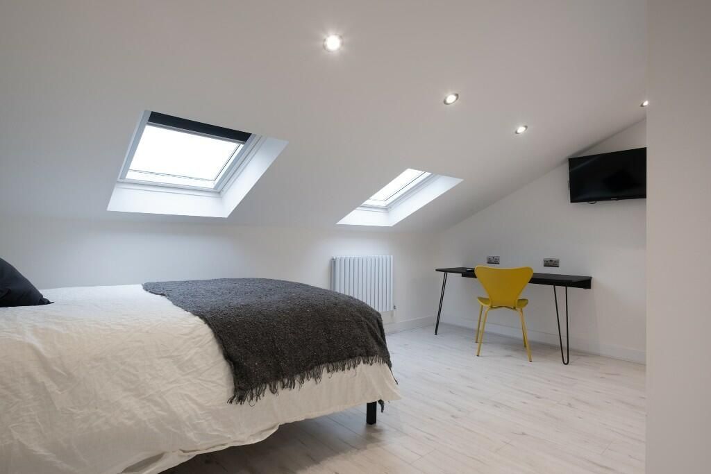 Property photo 2 of 14 A Modern, Well-Lit Living Room With Spaciousness i...