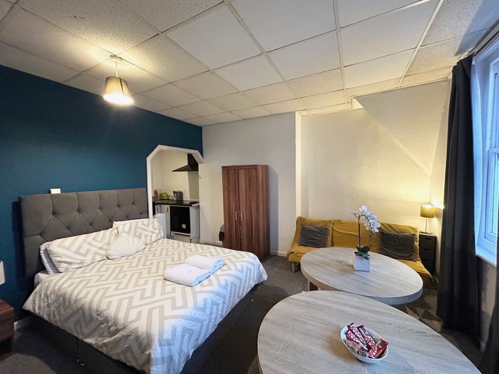 Property photo 2 of 8 Living Area