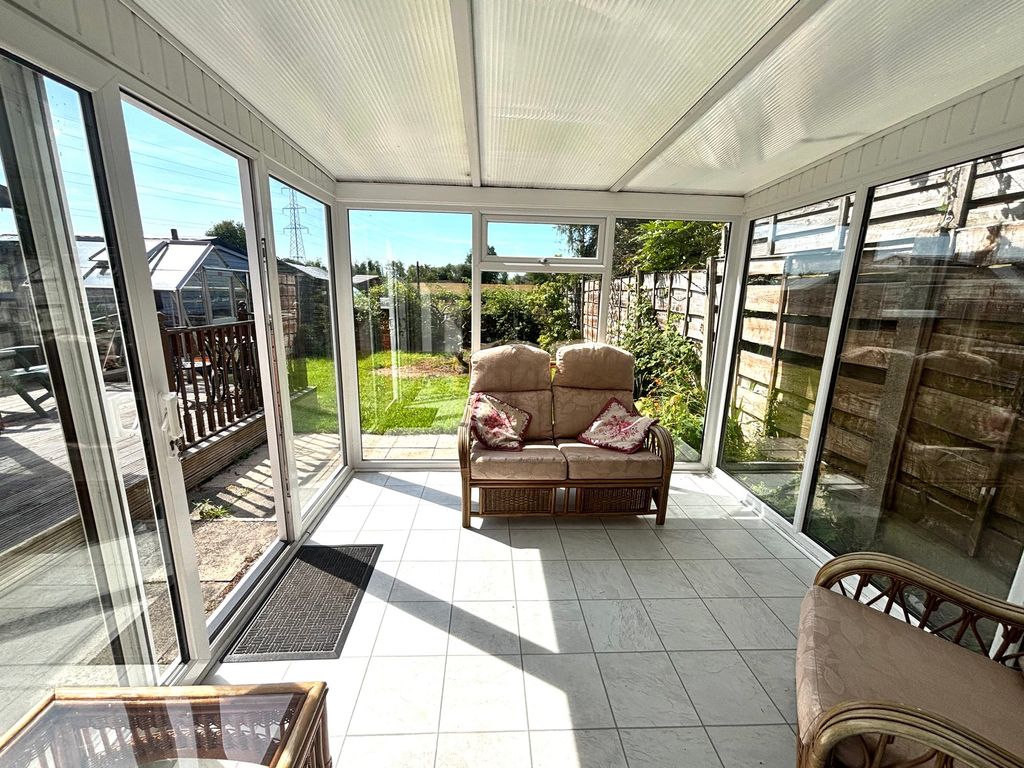 Property photo 3 of 18 Conservatory