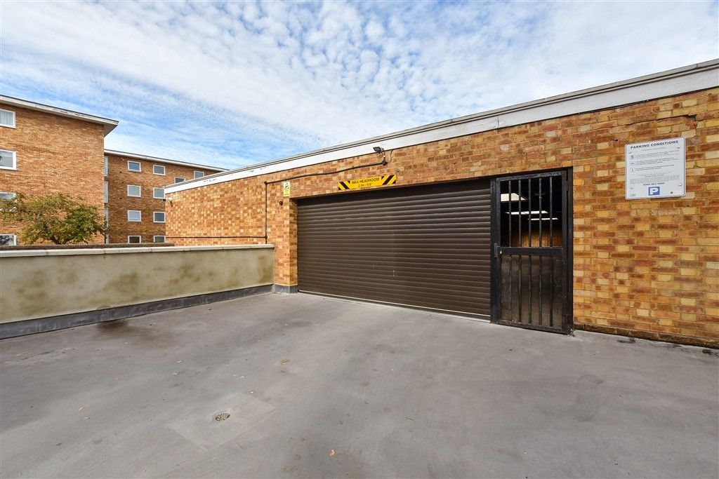 Property photo 2 of 12 Garage