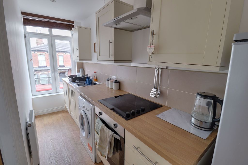 Property photo 2 of 8 Kitchen