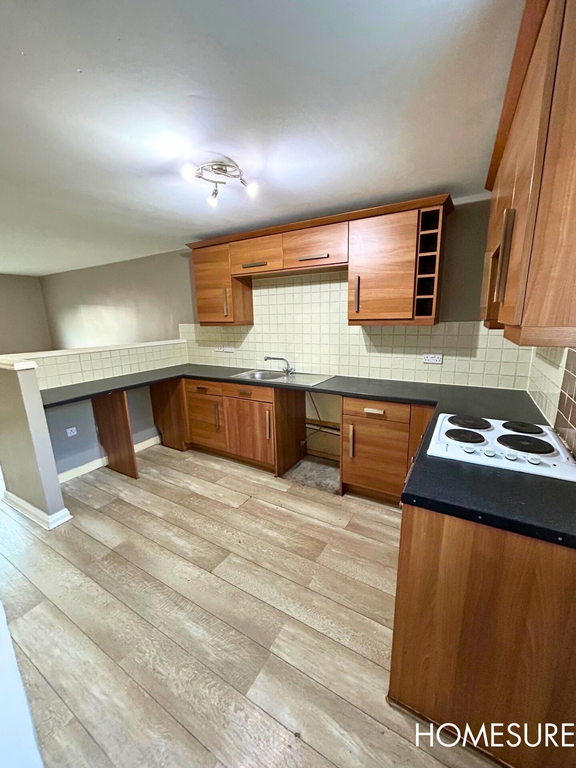 Property photo 1 of 7 Kitchen