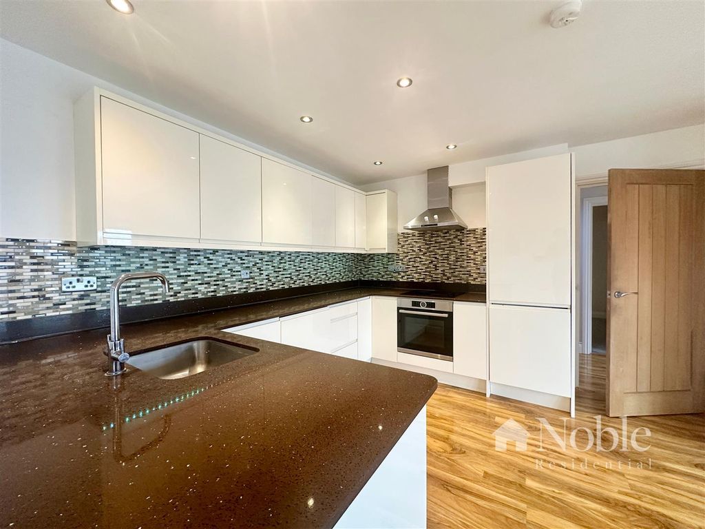 Property photo 3 of 14 Kitchen Area
