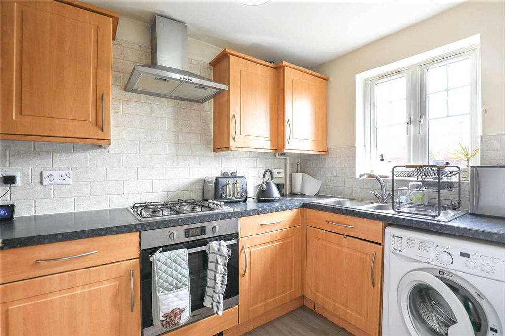 Property photo 3 of 12 Kitchen