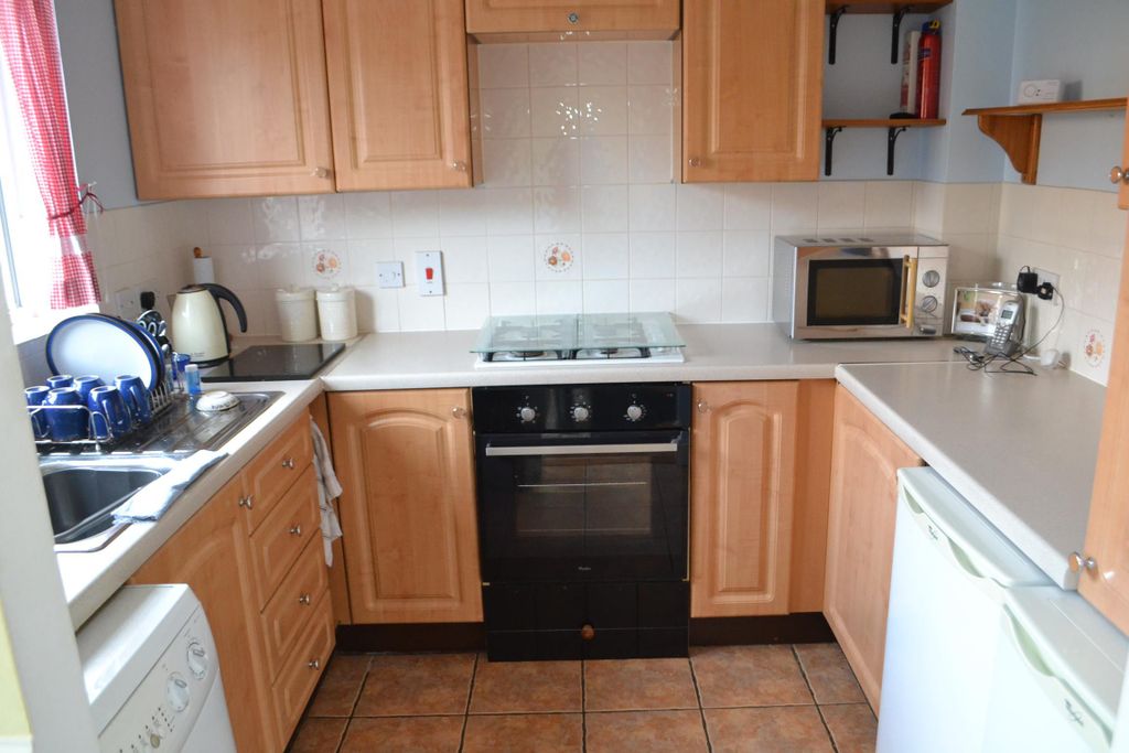 Property photo 2 of 12 Kitchen