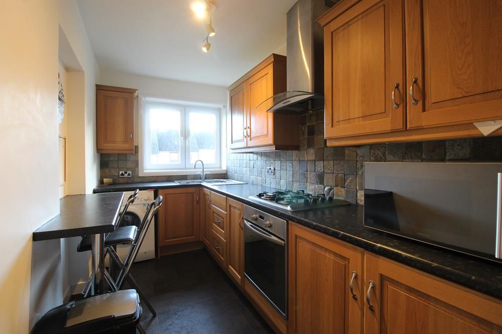 Property photo 3 of 7 Kitchen