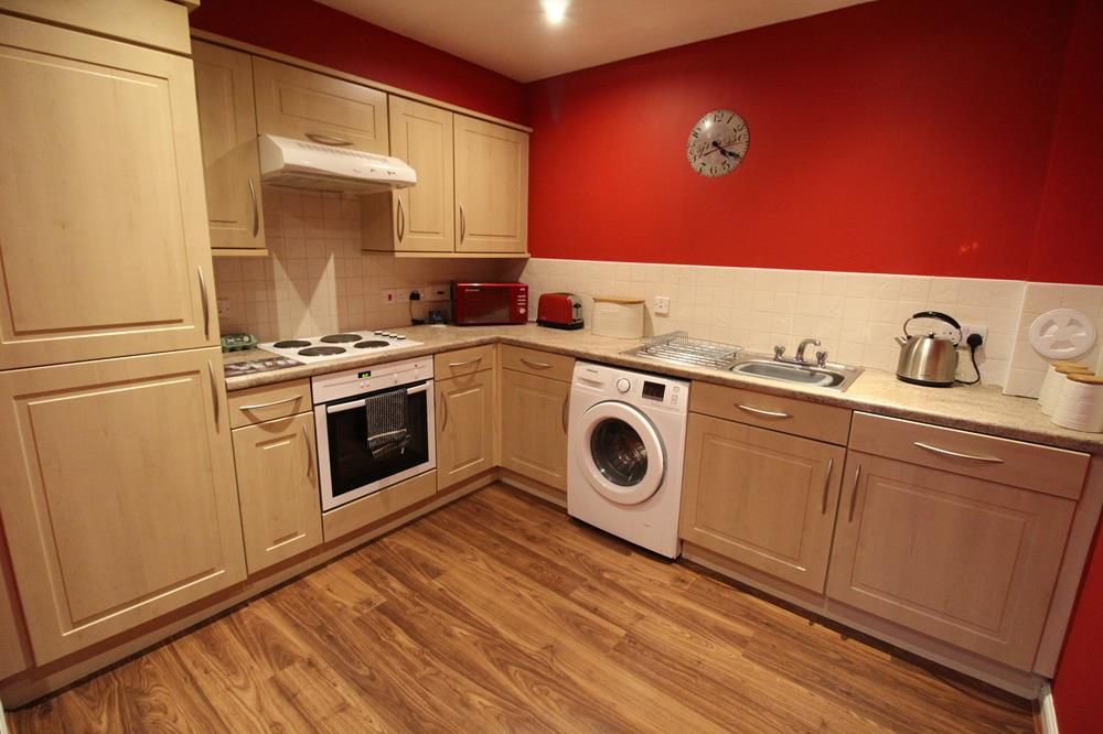 Property photo 3 of 8 Kitchen