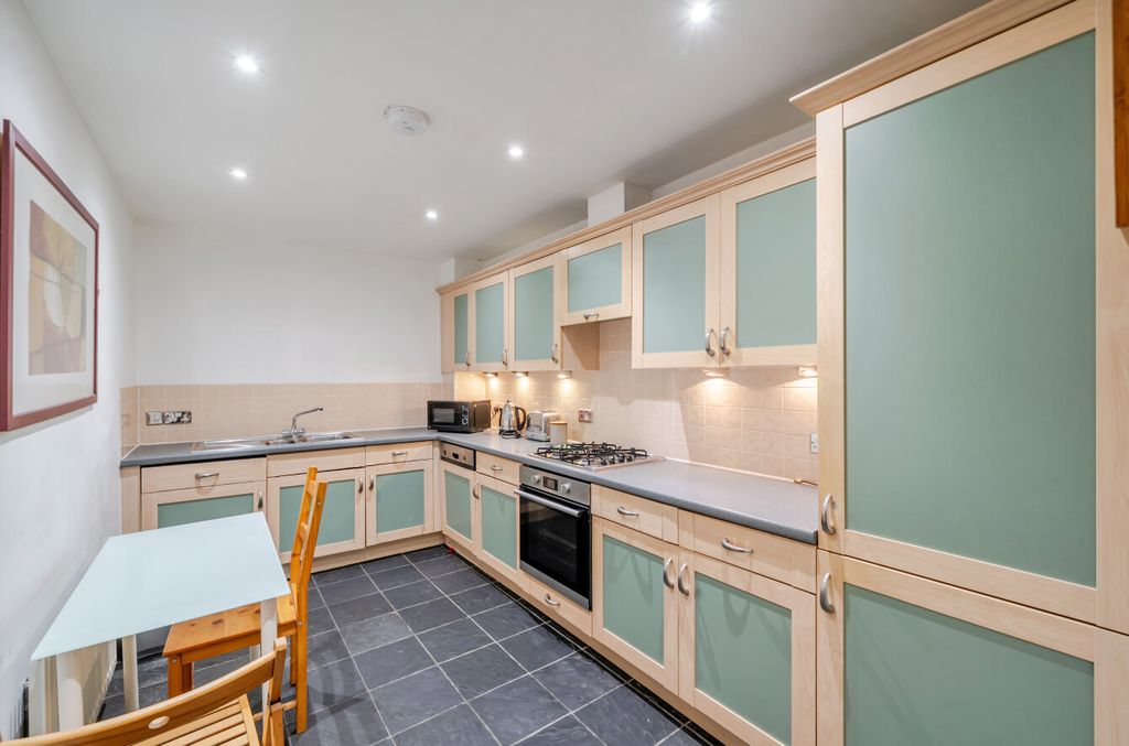 Property photo 2 of 11 Kitchen