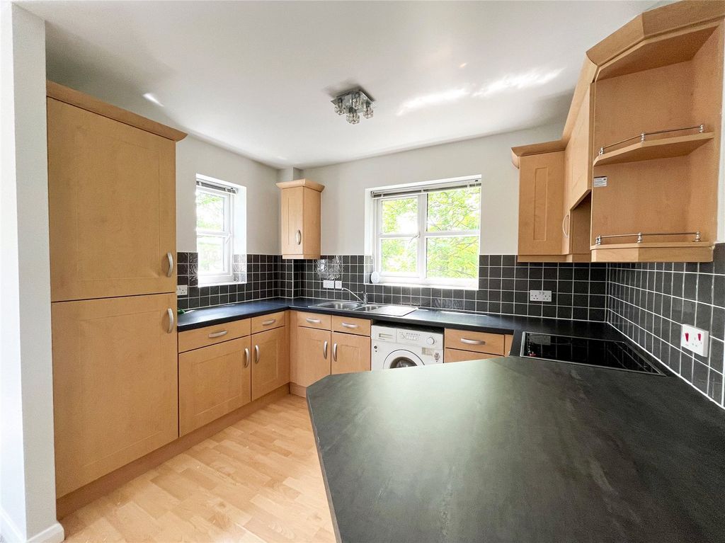 Property photo 3 of 12 Kitchen