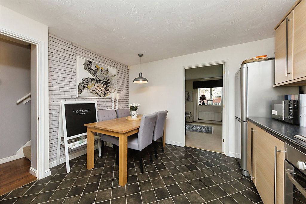 Property photo 3 of 12 Kitchen One