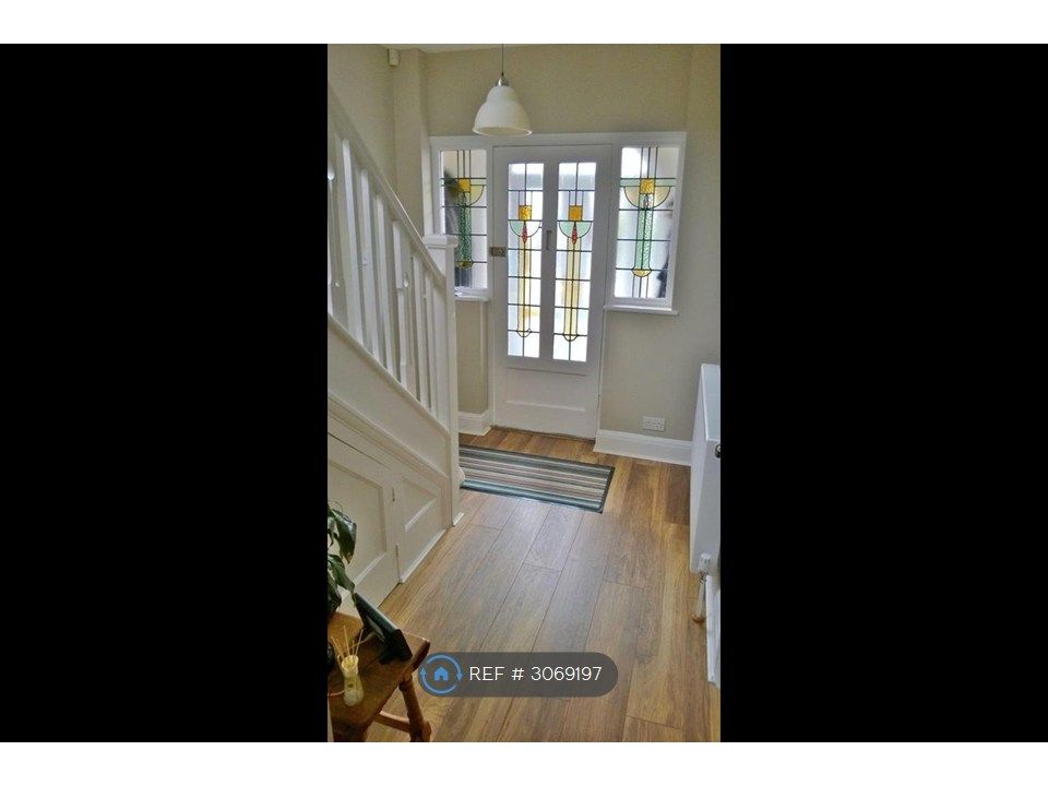 Property photo 2 of 9 Entrance Featuring Original Stained Glass
