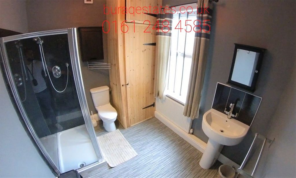 Property photo 2 of 8 Bright And Modern Bathroom Suite Featuring A Spaci...