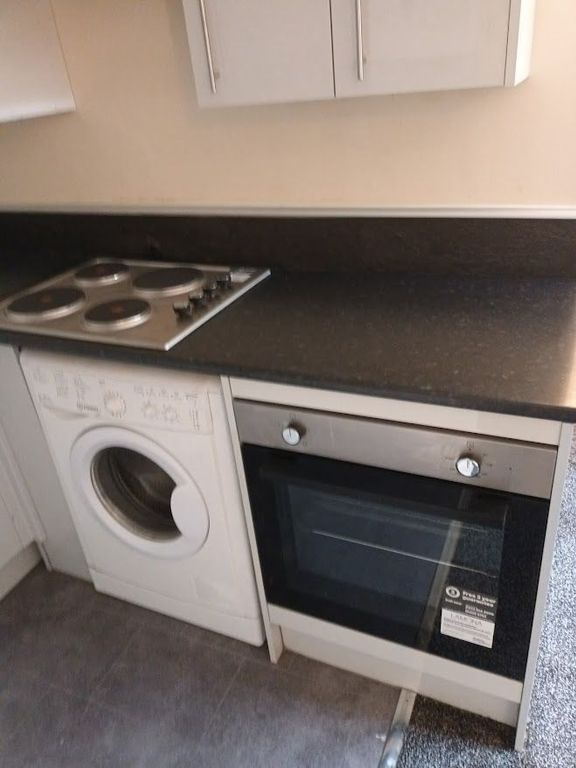 Property photo 3 of 7 Modern Kitchen With Integrated Oven And Laundry...