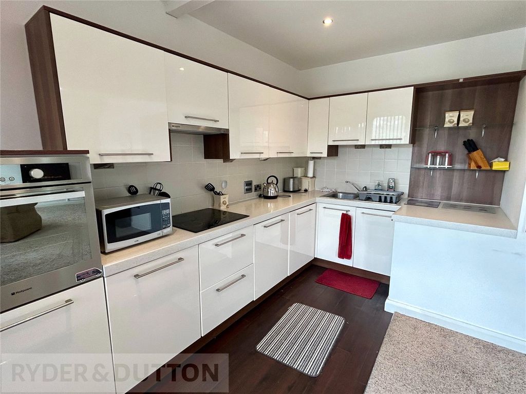 Property photo 2 of 11 Kitchen Area