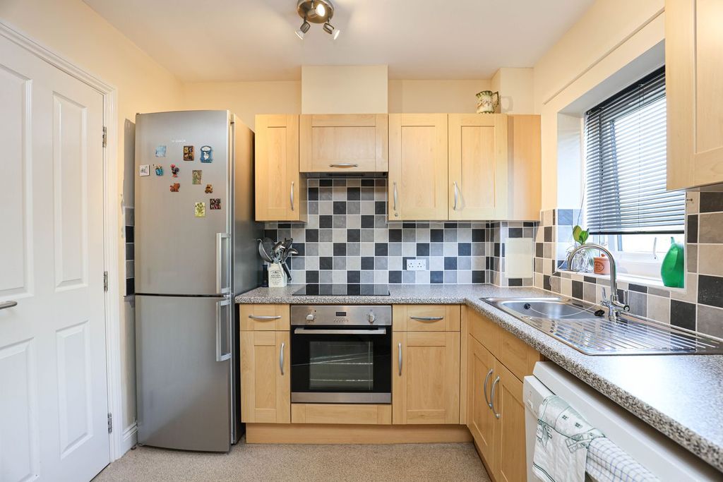 Property photo 3 of 13 Kitchen Area