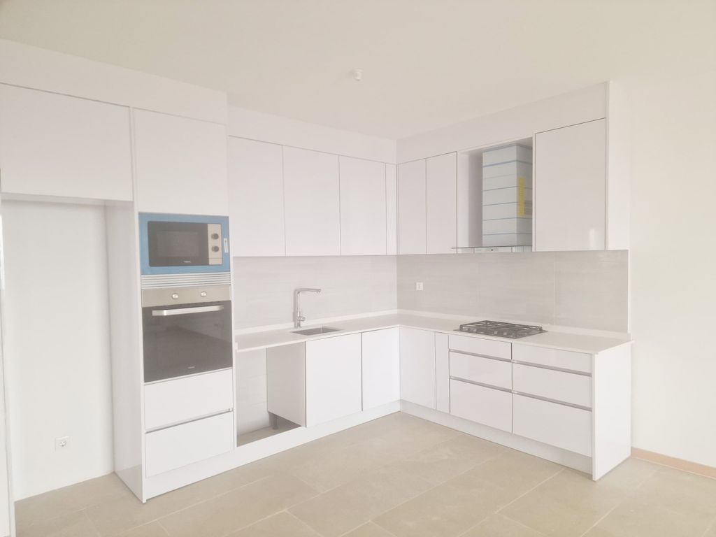 Property photo 2 of 17 Kitchen Area