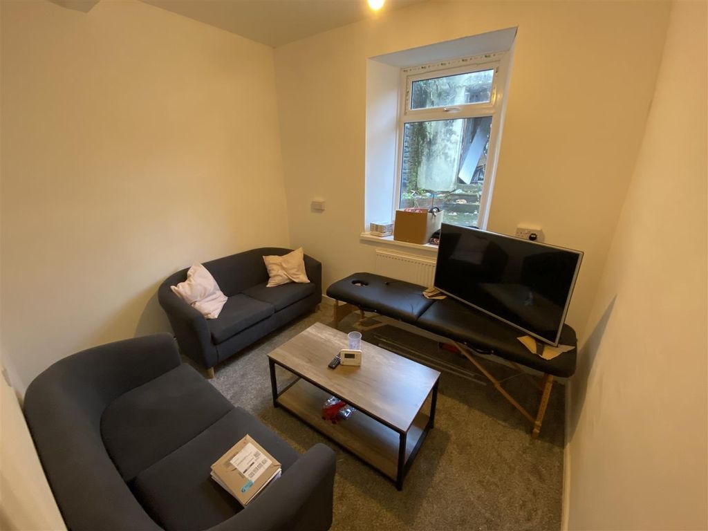 Property photo 2 of 7 Cosy Lounge Area With Plush Sofas And Large TV...