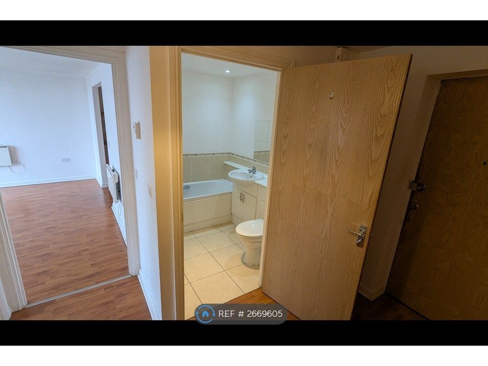 Property photo 3 of 21 Hallway To Living Room