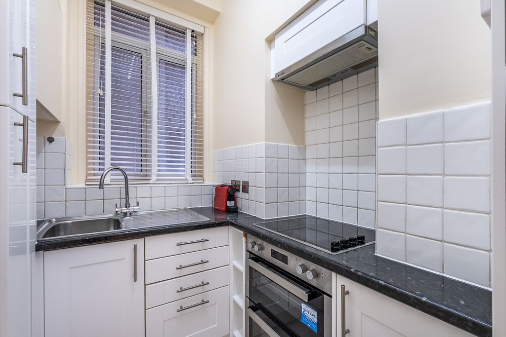Property photo 3 of 12 Kitchen