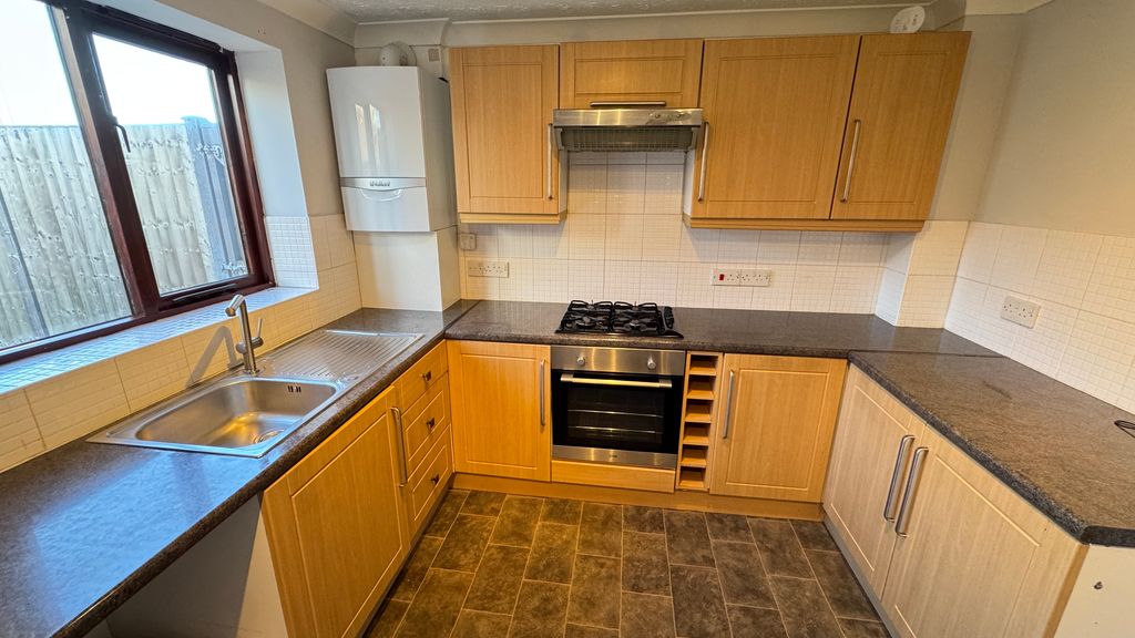 Property photo 3 of 13 Kitchen