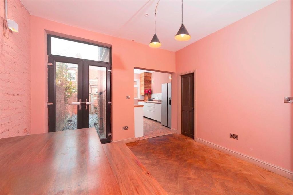 Property photo 2 of 7 Bright Lounge With Wooden Floors And Pendant Lamps...