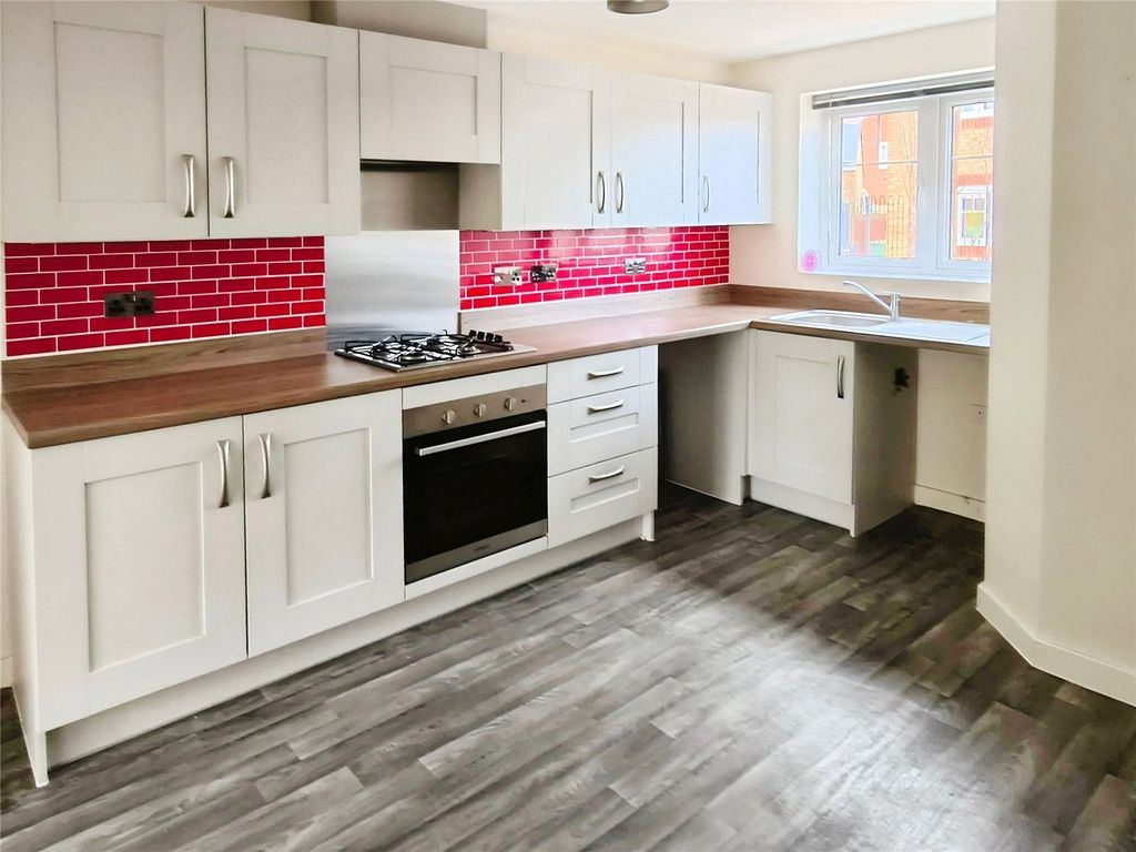 Property photo 2 of 12 Kitchen