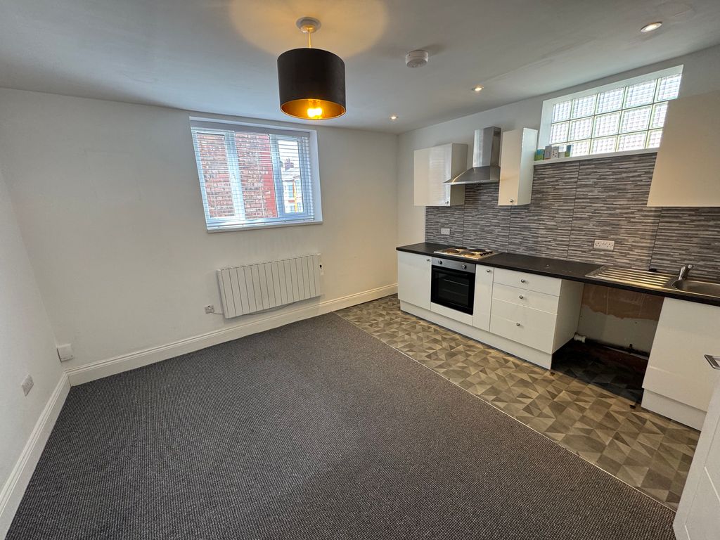 Property photo 2 of 11 Kitchen Living Room
