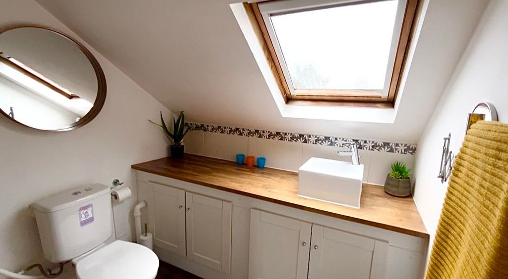 Property photo 1 of 9 A Beautifully Designed Bathroom Featuring A Stylis...