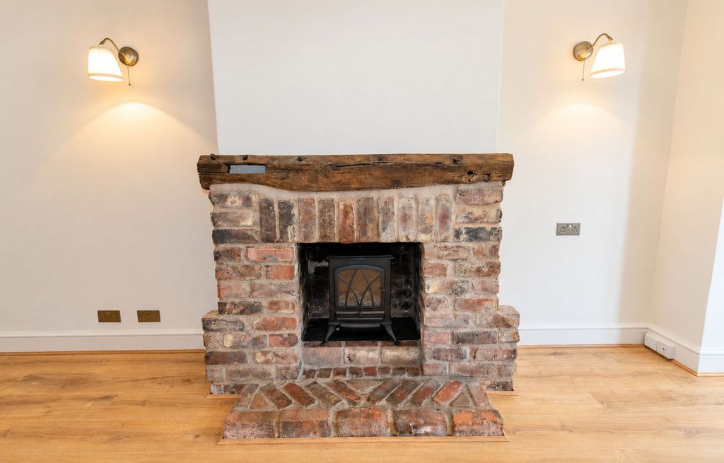 Property photo 3 of 13 Fireplace