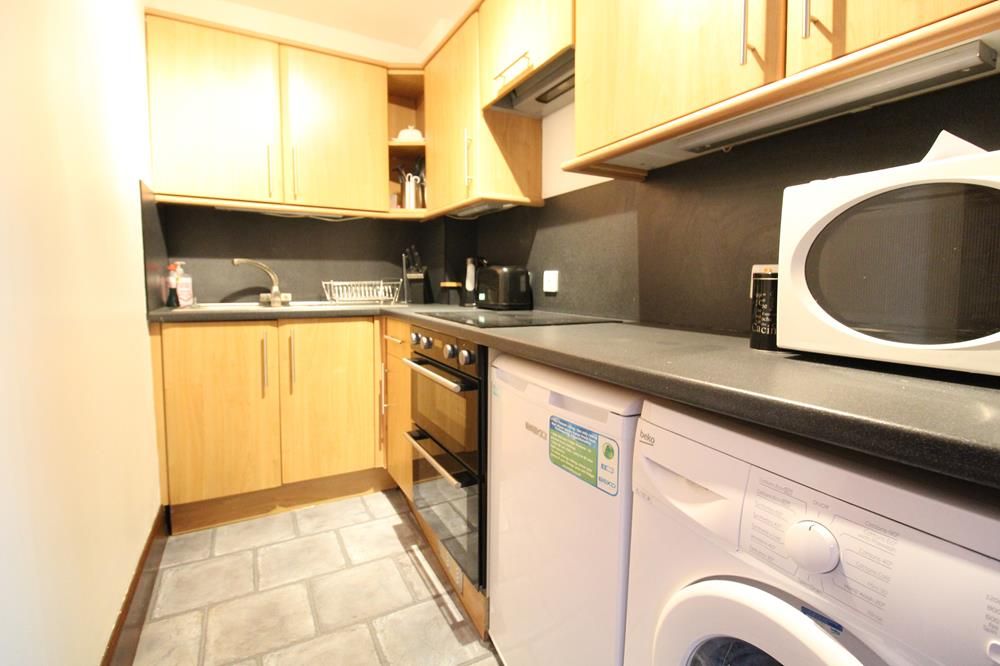 Property photo 3 of 9 Kitchen