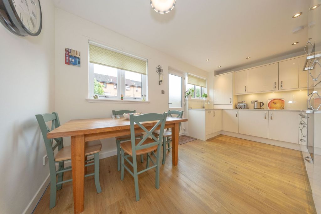 Property photo 3 of 26 Dining Kitchen