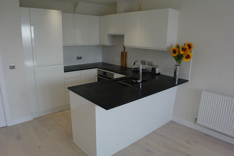 Property photo 2 of 12 Kitchen Area